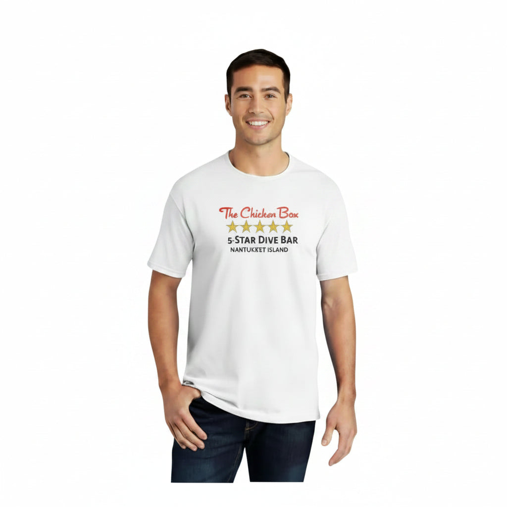 A man wearing a white short-sleeve graphic t-shirt with a 'The Chicken Bar' 5-star review design, paired with dark blue jeans, against a plain white background.